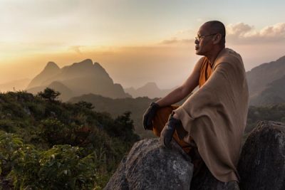 Monk on the summit of Chiang Dao